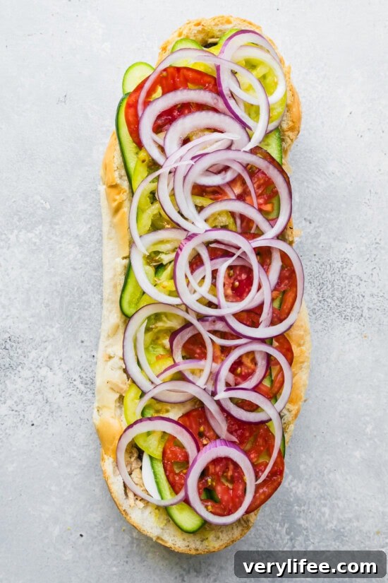 Pan Bagnat: Nicoise Tuna Sandwich 9 add tomatoes, red onion and eggs