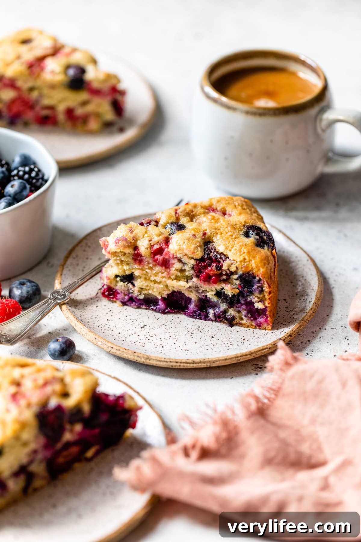 plates of Berry Buckle with coffee