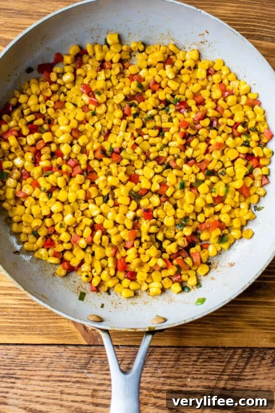 crab and bell peppers in a skillet