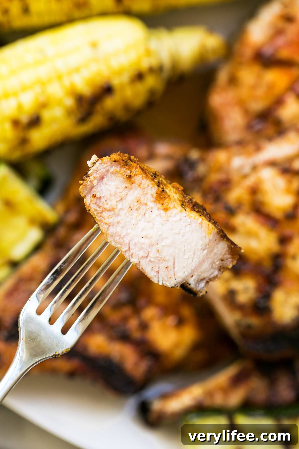 Grilled Pork Chop on a fork