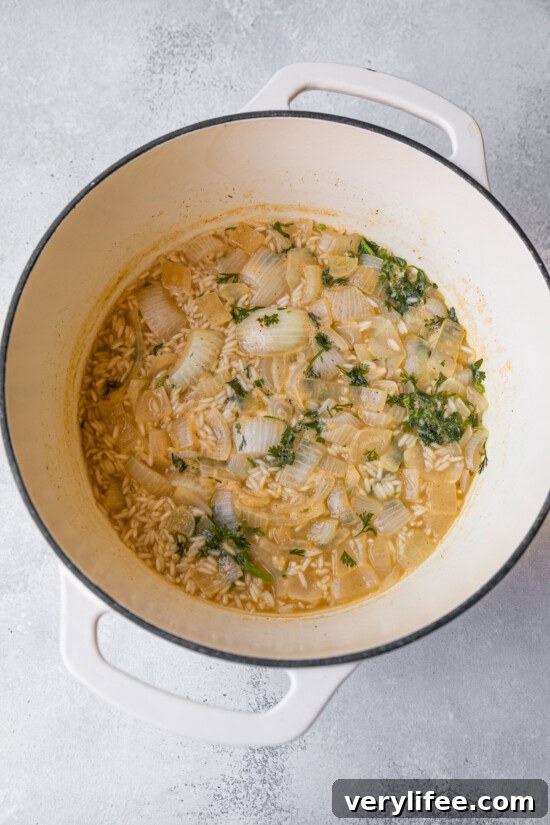 Arroz con Camarones: Shrimp and Rice Recipe 7 Cooking rice in a pot