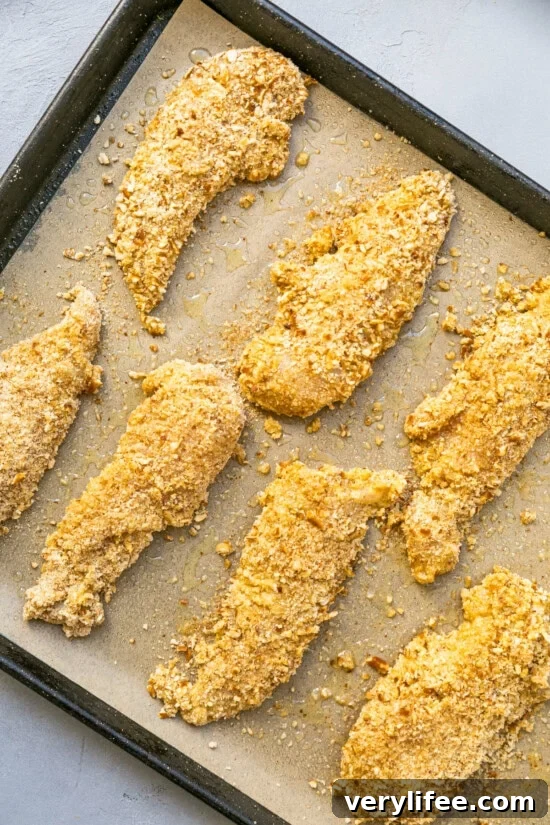 Crispy Pretzel Crusted Chicken Tenders Recipe 9 pretzel breaded chicken fingers ready to bake.