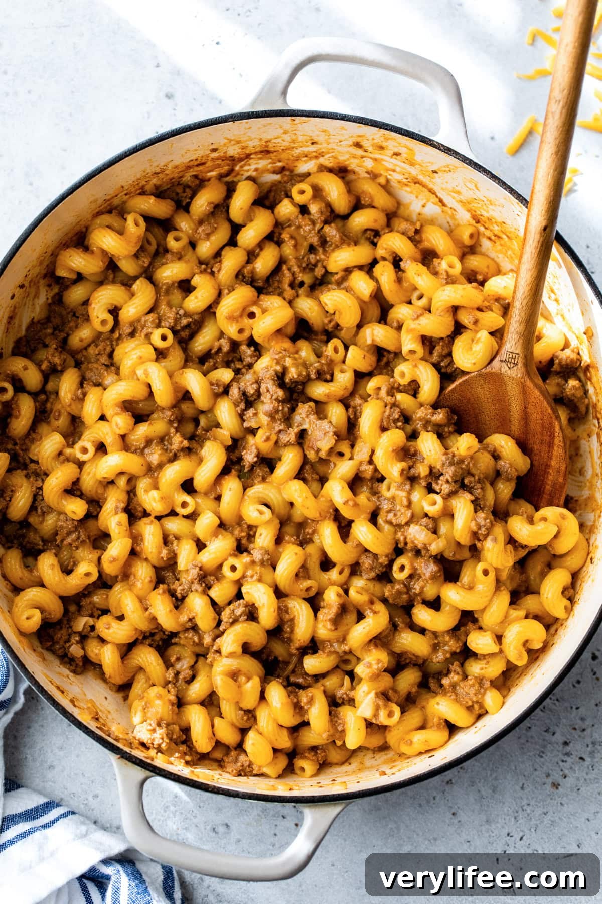 Homemade Hamburger Helper Recipe from Scratch 3 Ground beef, macaroni and cheese in a skillet.