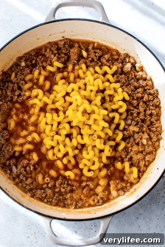 Homemade Hamburger Helper Recipe from Scratch 8 Add the pasta and broth and cook until tender.