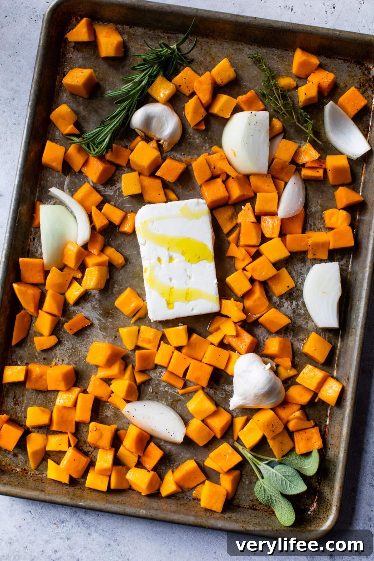 Sheet pan with butternut squash feta cheese and onions