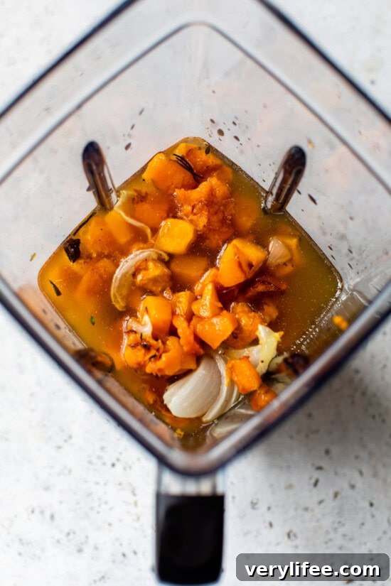 Add vegetables and broth to the blender