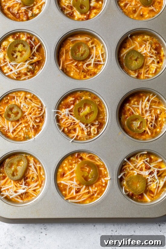 Spicy Chorizo Egg Bites Recipe for Breakfast 9 Pour egg mixture in the muffin tin.