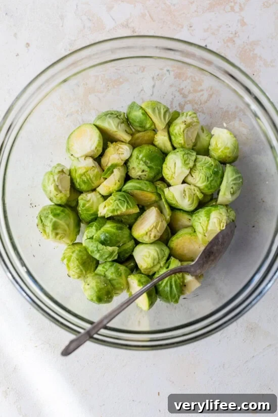 toss Brussel Sprouts with olive oil, salt and pepper.