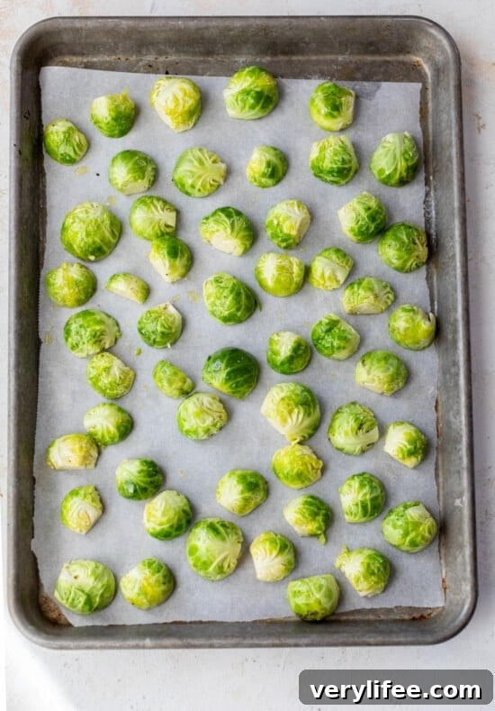 Place brussel sprouts cut side down on a sheet pan.