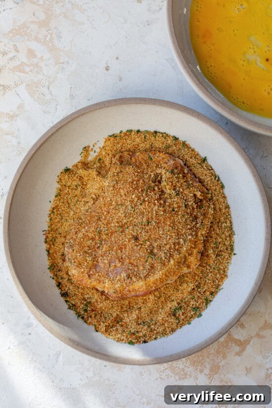 Crispy Pork Milanese with Kale and Apple Salad 7 Breading pork cutlets
