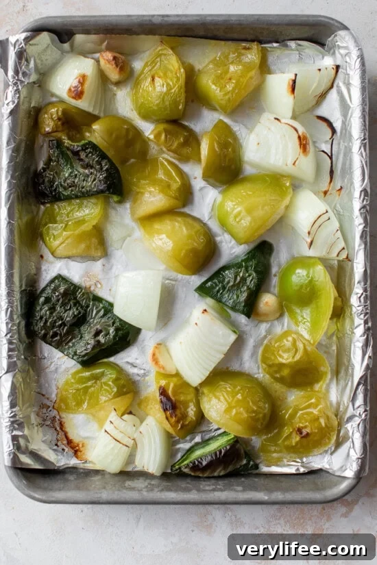 Roast tomatillos, onions, poblano and garlic