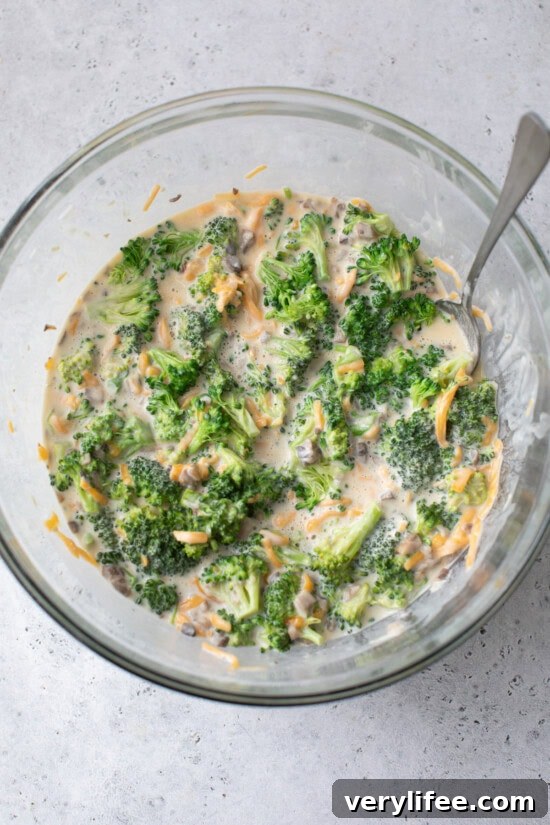 Mix soup with broccoli and cheese.