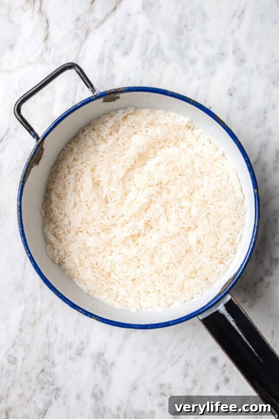 Rinsed rice in pan