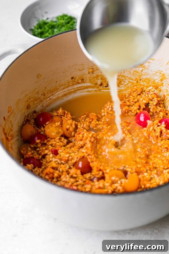 Creamy Lobster Risotto Recipe with Parmesan 7 Ladle the broth