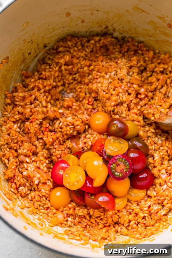 Creamy Lobster Risotto Recipe with Parmesan 8 Add tomatoes