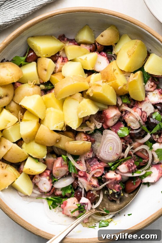 Zesty Mediterranean Octopus Salad with Lemon and Herbs 8 Octopus and potatoes