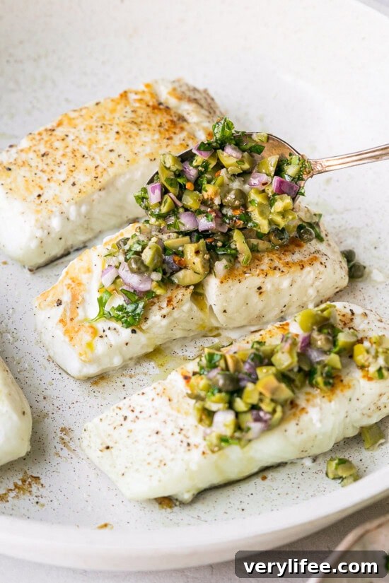 Crispy Pan-Seared Fish with Olive Chimichurri Sauce 8 spoon olive chimichurri over fish