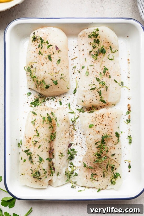 Crispy Lemon Garlic Oven-Baked Cod 6 fish in a pan