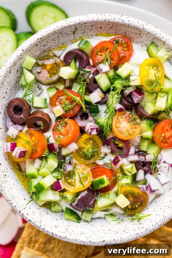 Whipped Greek Cottage Cheese Dip Recipe 8 Top with fresh vegetables and herbs.