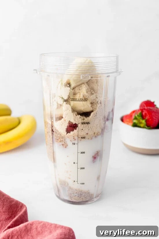 blender with protein powder and milk