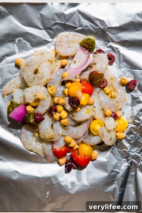 Lemon Garlic Shrimp Foil Packets Recipe 6 Shrimp, tomatoes, olives in Foil Packets