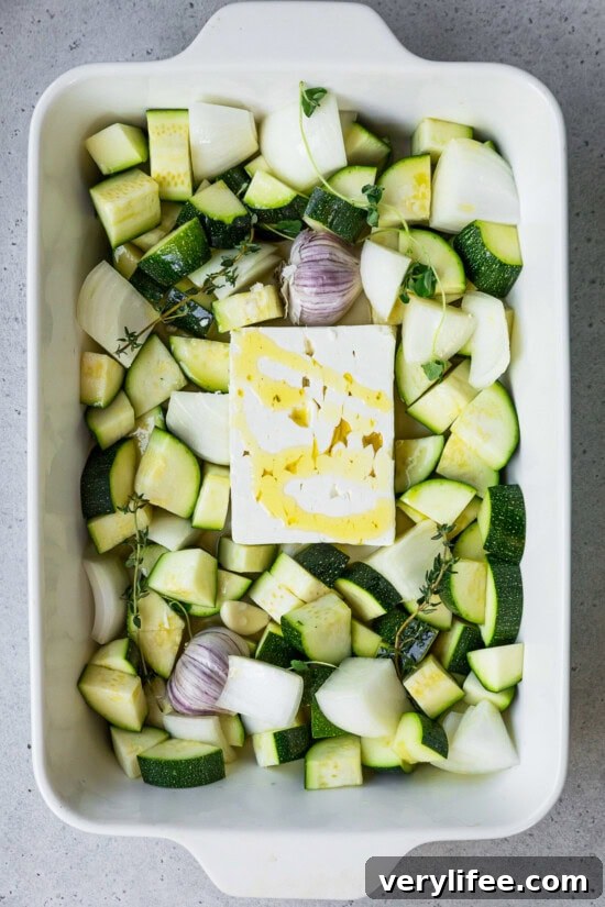 Creamy Roasted Zucchini Soup with Feta 6 baking dish with zucchini, feta, garlic