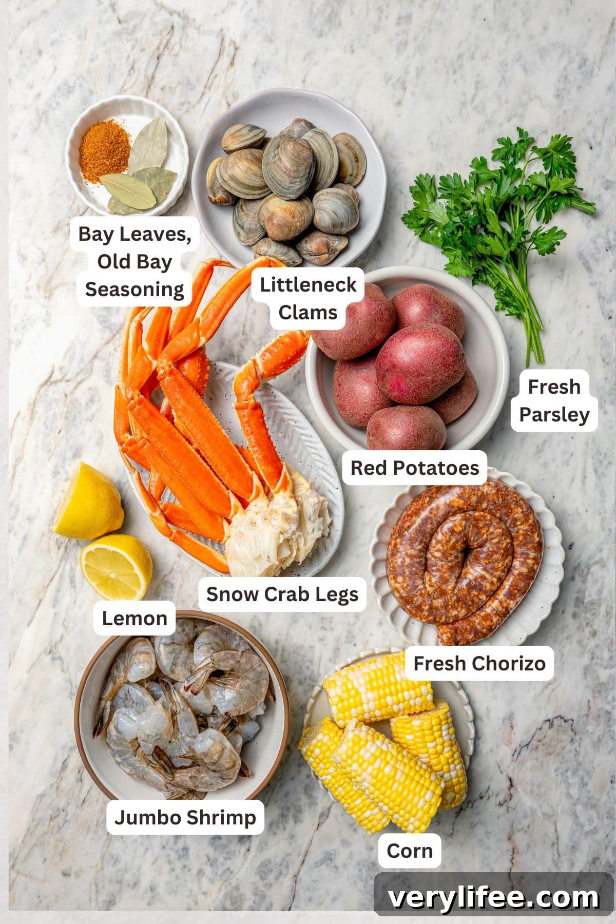 Overhead view of ingredients for one pot seafood boil