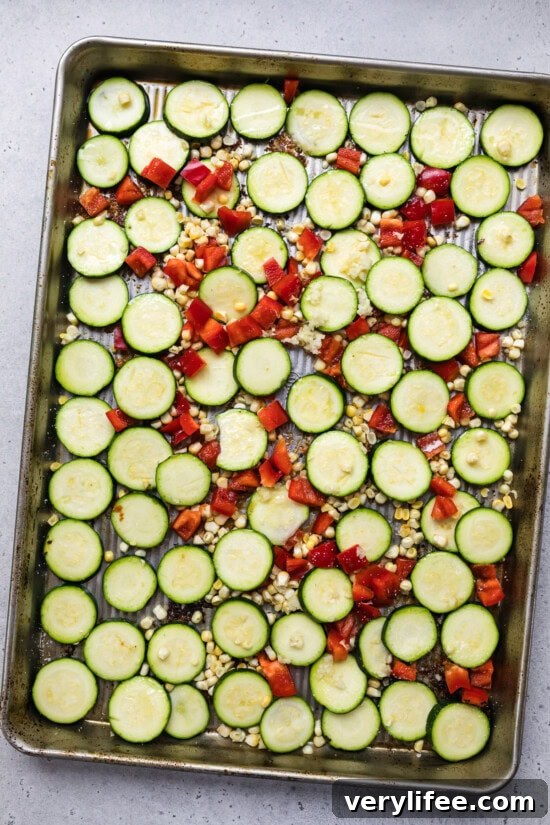 Sheet-Pan Chicken Drumsticks with Zucchini and Corn Recipe 8 sheet pan with zucchini, corn and bell peppers