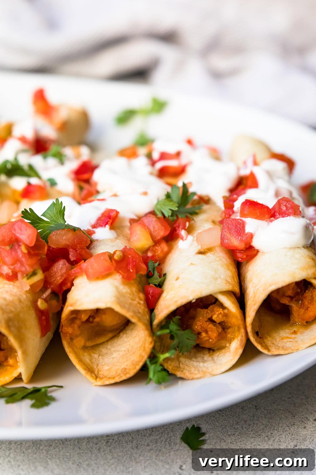 Crispy Chicken Taquitos with Avocado Crema 14 Chicken Taquitos