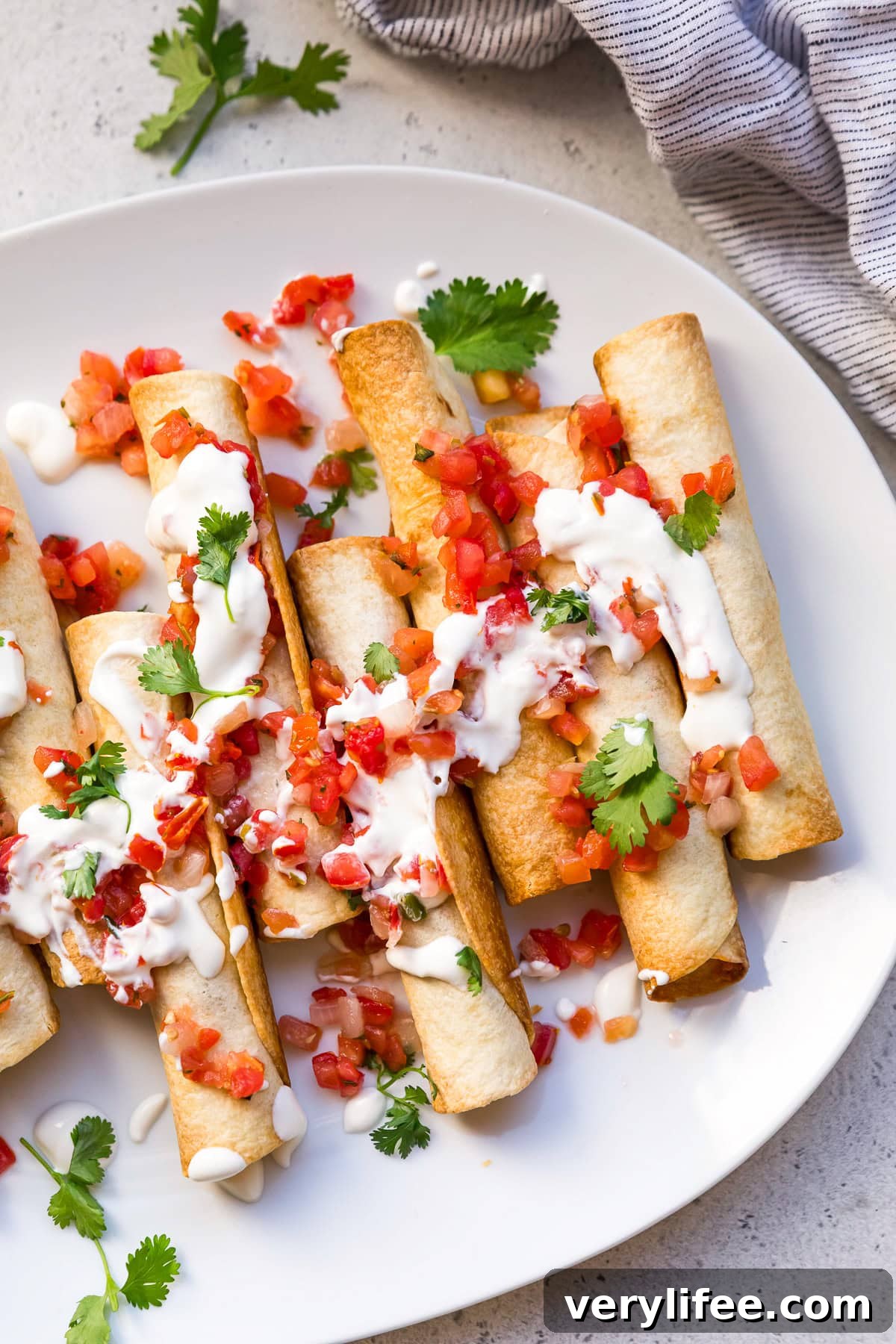 Crispy Chicken Taquitos with Avocado Crema 9 Chicken Taquitos