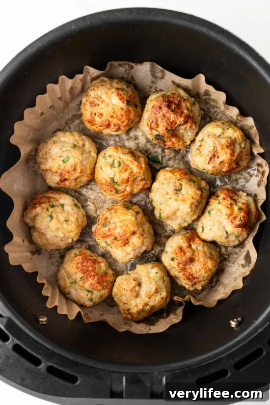Crispy Air Fryer Meatball Subs with Melty Cheese 7 Air Fryer Meatballs in the air fryer basket