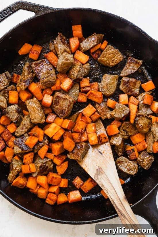 Return sweet potatoes to skillet