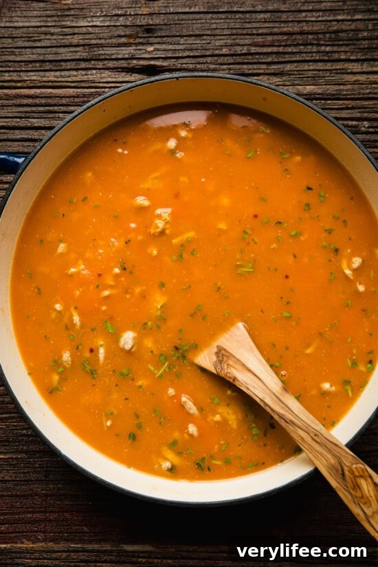 Creamy Pumpkin Lasagna Skillet 7 Add pumpkin and broth