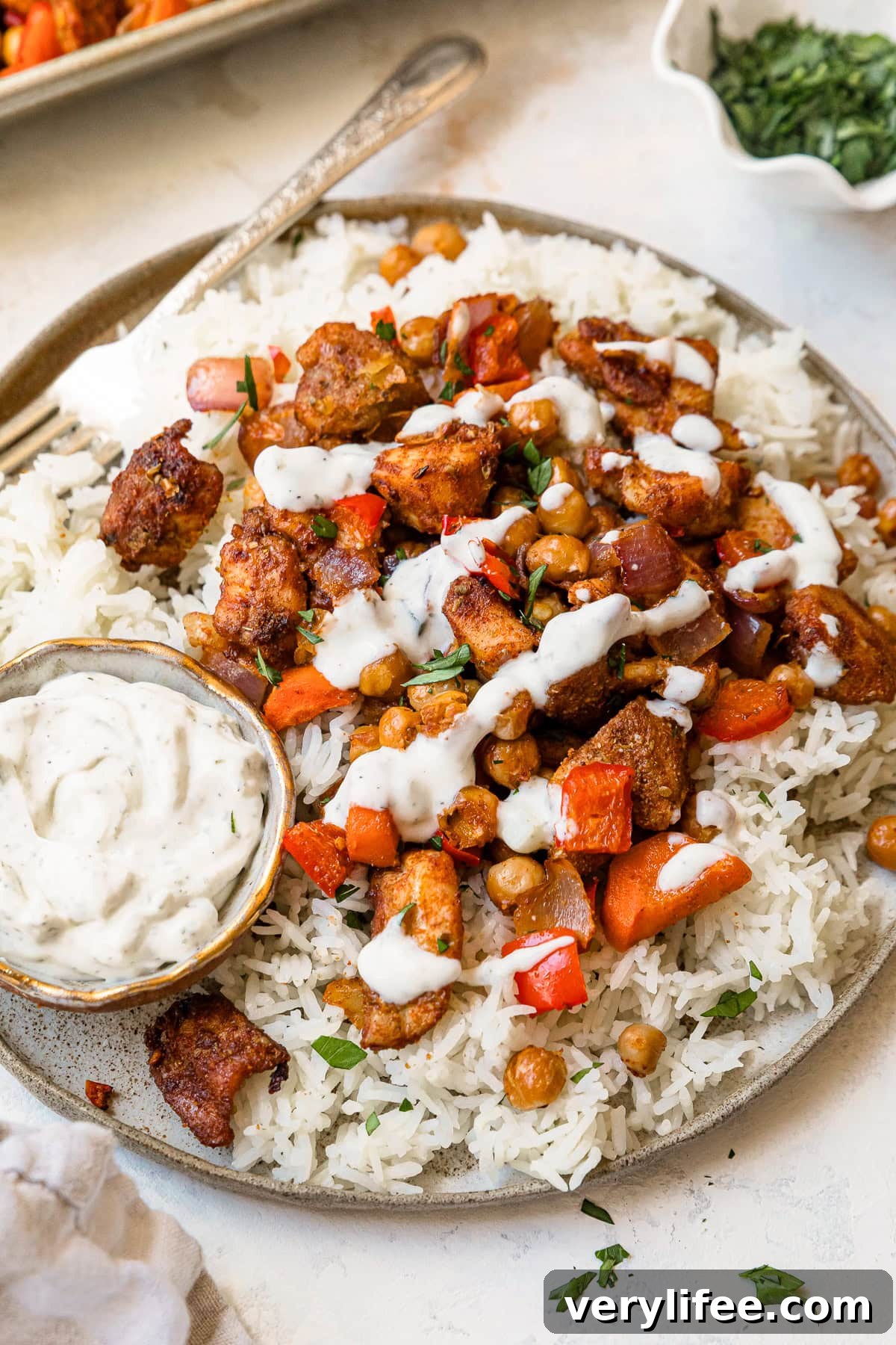 Chicken Shawarma with veggies and chickpeas over rice