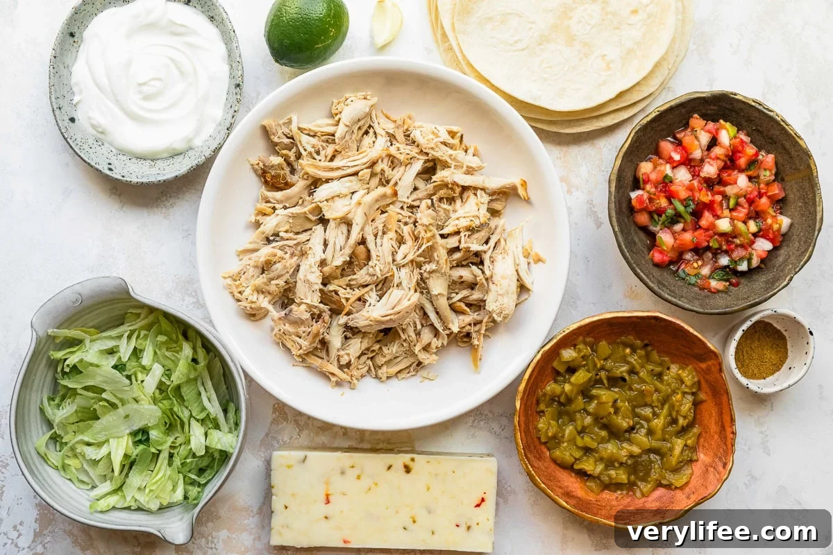 Flauta ingredients; shredded chicken, cheese, tortilla, pico de gallo