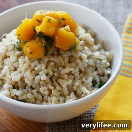 Coconut milk, brown rice, coconut flakes, fresh ginger and cilantro are combined to create this simple side dish, perfect to accompany many Thai dishes.