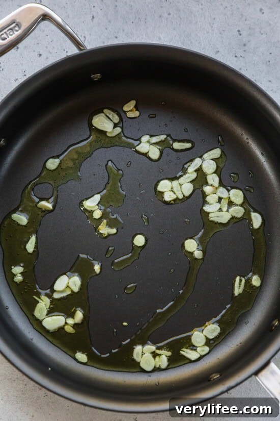 Oven-Roasted Parmesan Zucchini 6 saute garlic in a skillet