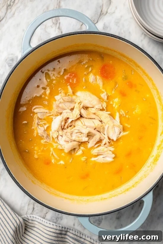 Creamy Chicken and Corn Chowder Recipe 8 Chicken added to pot of corn chowder.