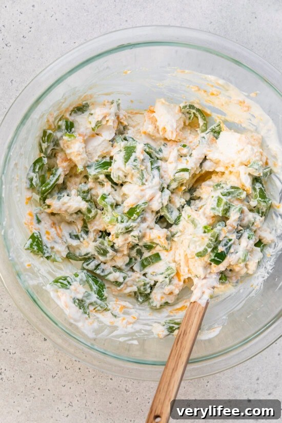 Mix with the cream cheese, yogurt and cheese