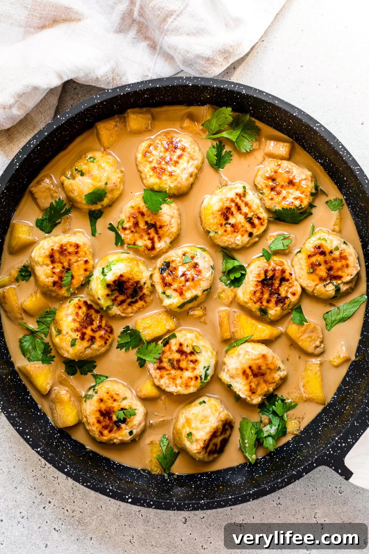 Pineapple-Glazed Hawaiian Chicken Meatballs 10 Hawaiian Chicken Meatballs with Pineapple Coconut Sauce over rice