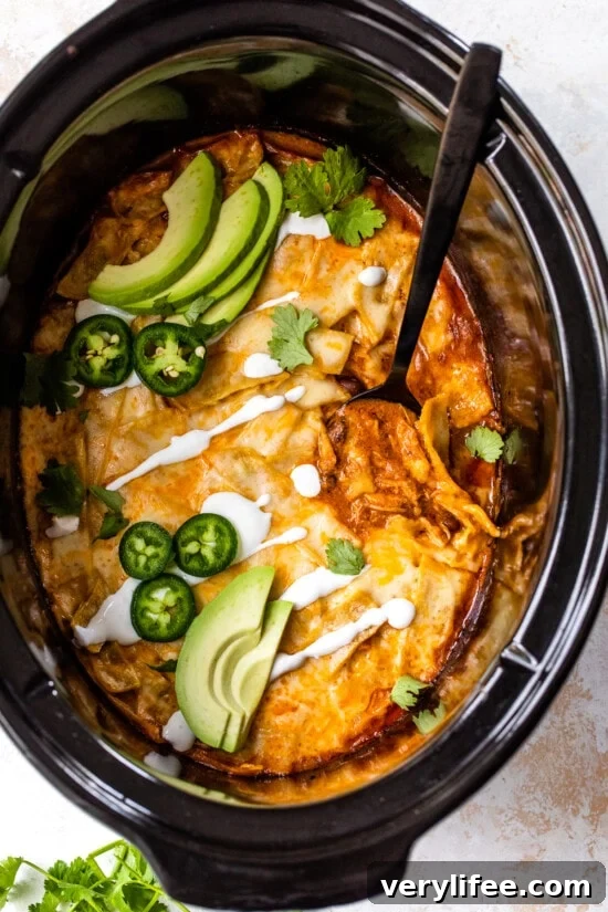 25 Crockpot Dinner Recipes to Enjoy Year-Round 10 Slow Cooker Chicken Enchilada casserole