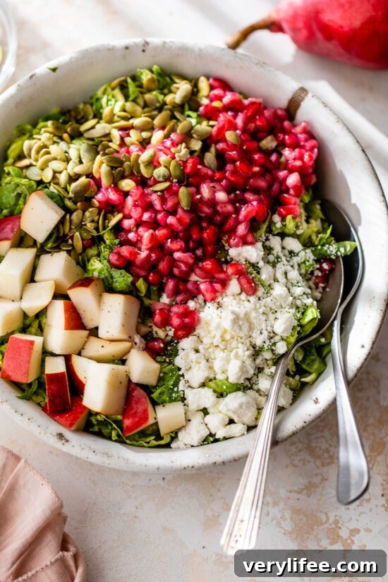 Shaved Brussels Sprouts Salad with Pears and Pomegranate
