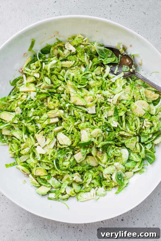 Butternut Squash & Brussels Sprout Salad with Pears, Maple Dijon 7 shred the brussels sprouts