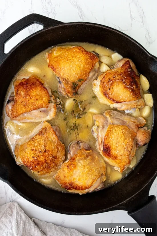 Add the garlic, wine, broth and herbs and bake