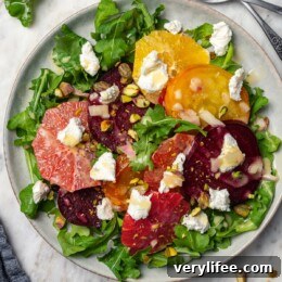 Roasted beet salad with citrus fruit, goat cheese, and pistachios.