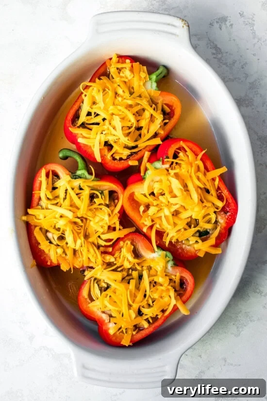 Egg and Cheese Breakfast Stuffed Peppers Recipe 8 Stuff the peppers and top with cheese