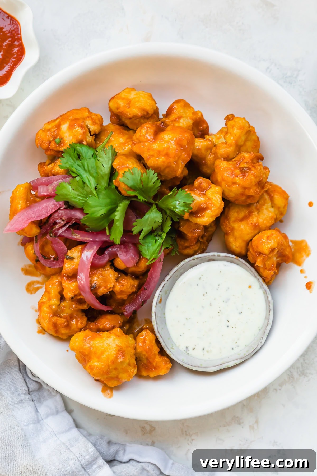 Crispy Air Fryer Cauliflower Wings with Honey Sriracha Recipe 10 Air Fryer Cauliflower Wings with Honey Sriracha and dipping sauce