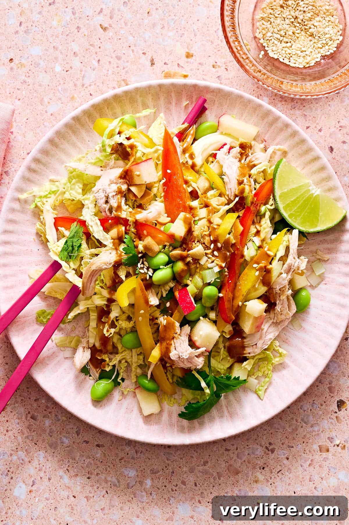 Thai-Inspired High-Protein Chicken Salad 17 This high-protein, Thai-inspired chicken salad features crunchy slaw, edamame, fresh herbs, roasted peanuts, and a light peanut-lime dressing—perfect for lunch or meal prep.