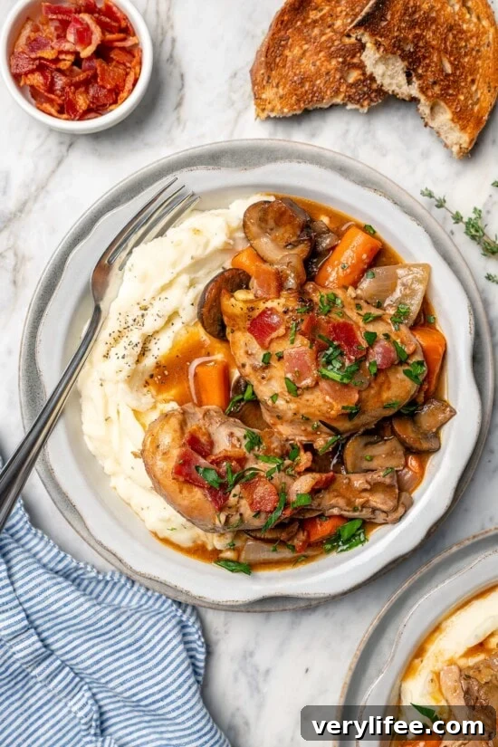 Top 25 Skinnytaste Recipes of 2025 24 Bowl of mashed potatoes topped with slow cooker coq au vin.