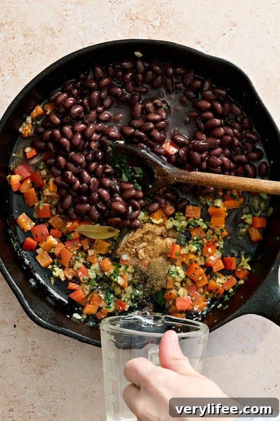 Chicken Taco Bowl Recipe: Flavorful Weeknight Meal 9 skillet with black beans and spices